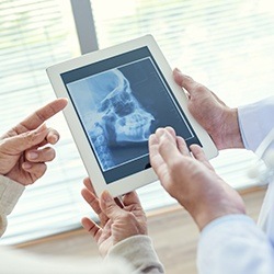 Dentists reviewing digital dental x-rays